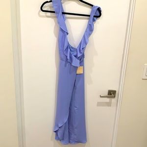 Never worn open back perfect for brunch/weddings/can be dressed up or down. :)